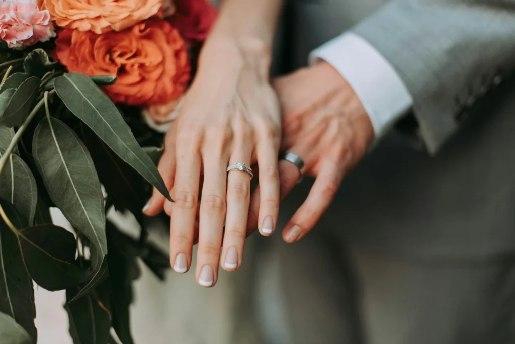 wedding rings on hands